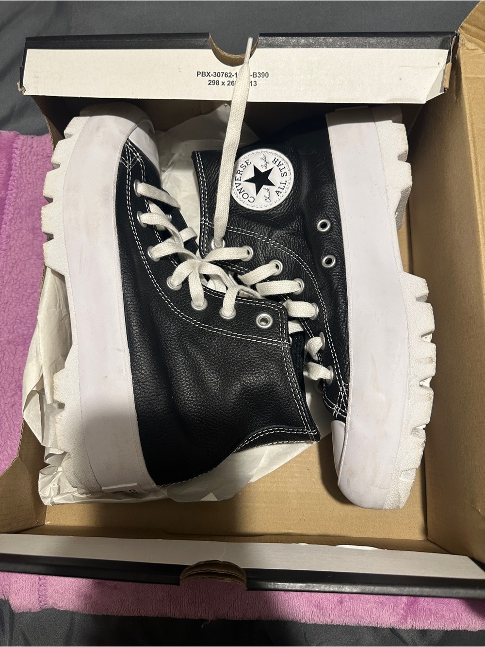 Converse High Top Sneakers in Black and White